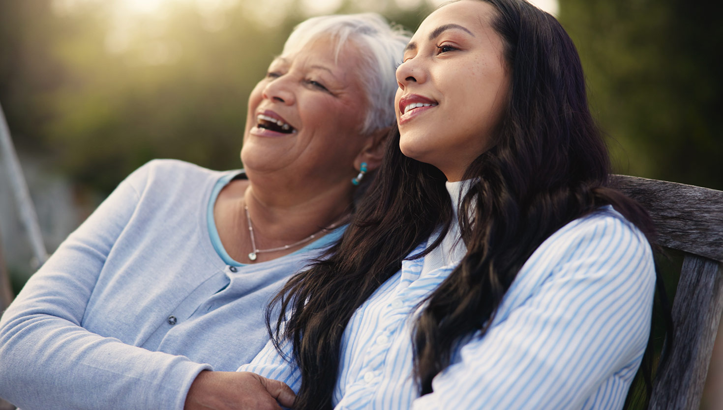 A smiling woman and her grandmother.