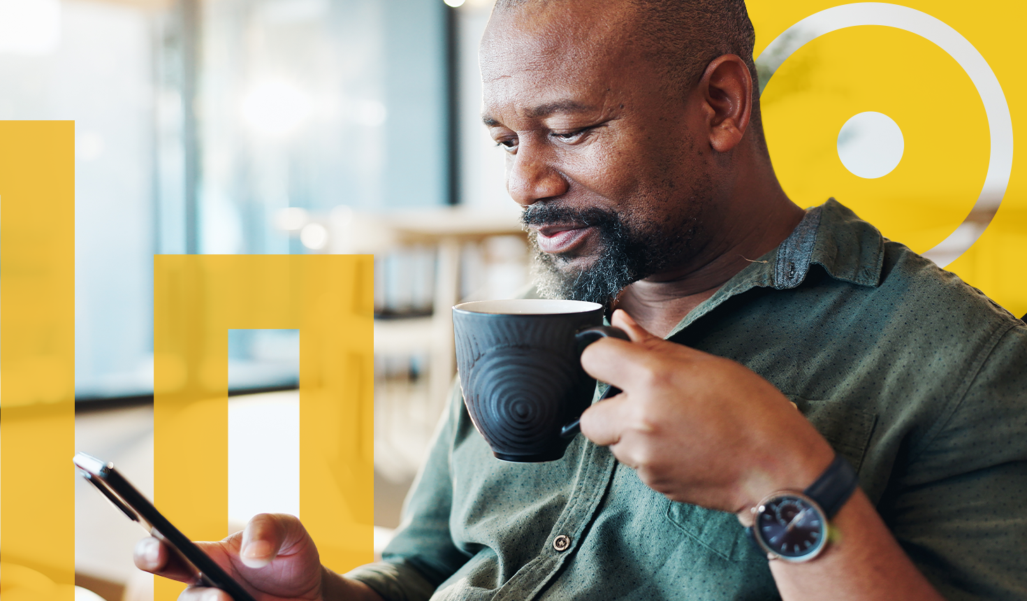 Man drinking coffee while banking with Equity Bank in Lee's Summit, Missouri